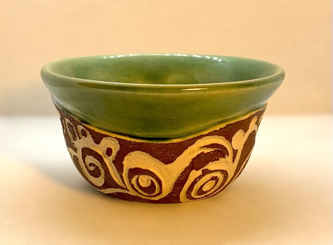 Interior verde exterior esgrafiado fierro