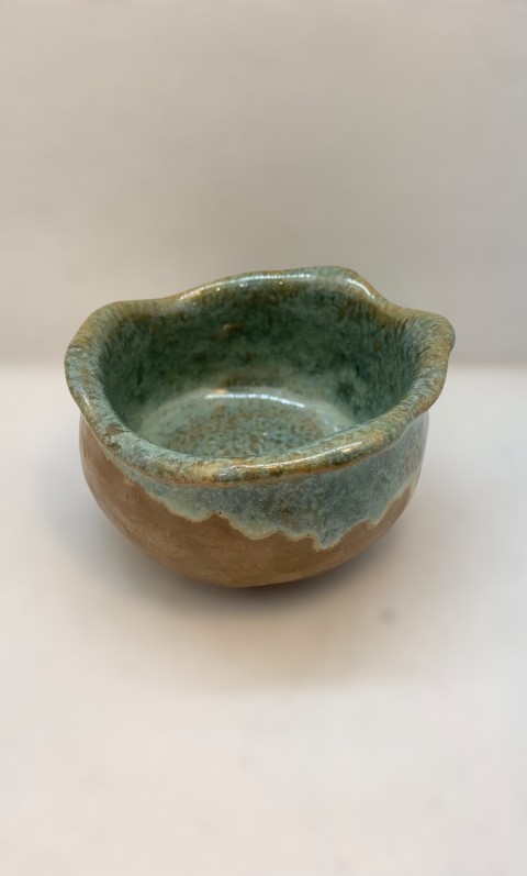 Pasta Chamiza. Pocillo forma saquito verde manzana (celeste) exterior café