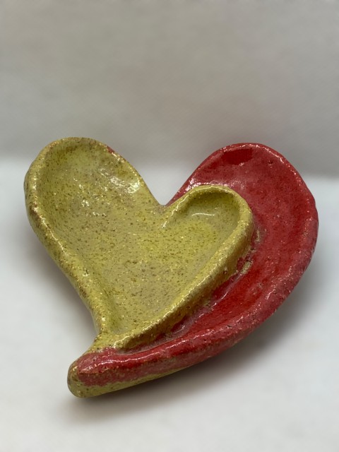 Corazón amarillo Mono en la izquierda,rojo Mono en la derecha. Reverso mezcla, CHZ