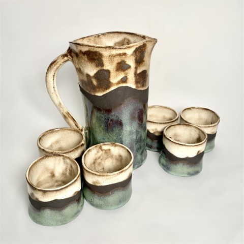 Set jarro pisco sour con 6 vasos pasta negra turquesa y blanco 