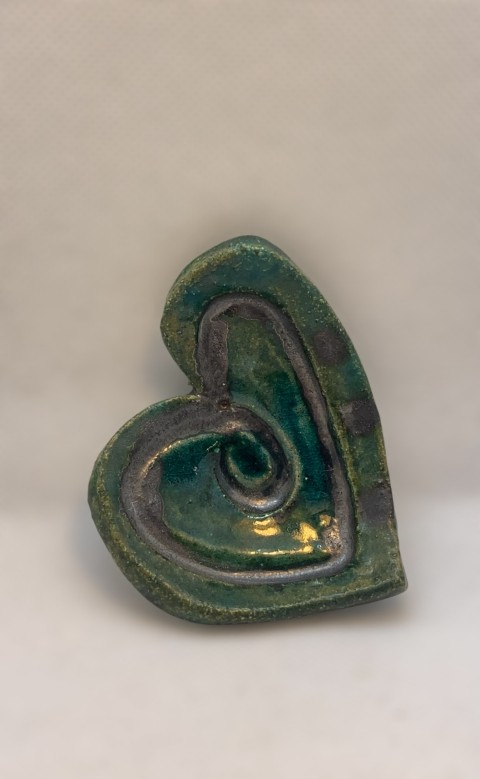 Corazón verde y dibujo cobre negro, turquesa al reverso CHZ